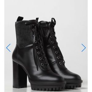 Martis Gianvito Rossi boots in calfskin leather .